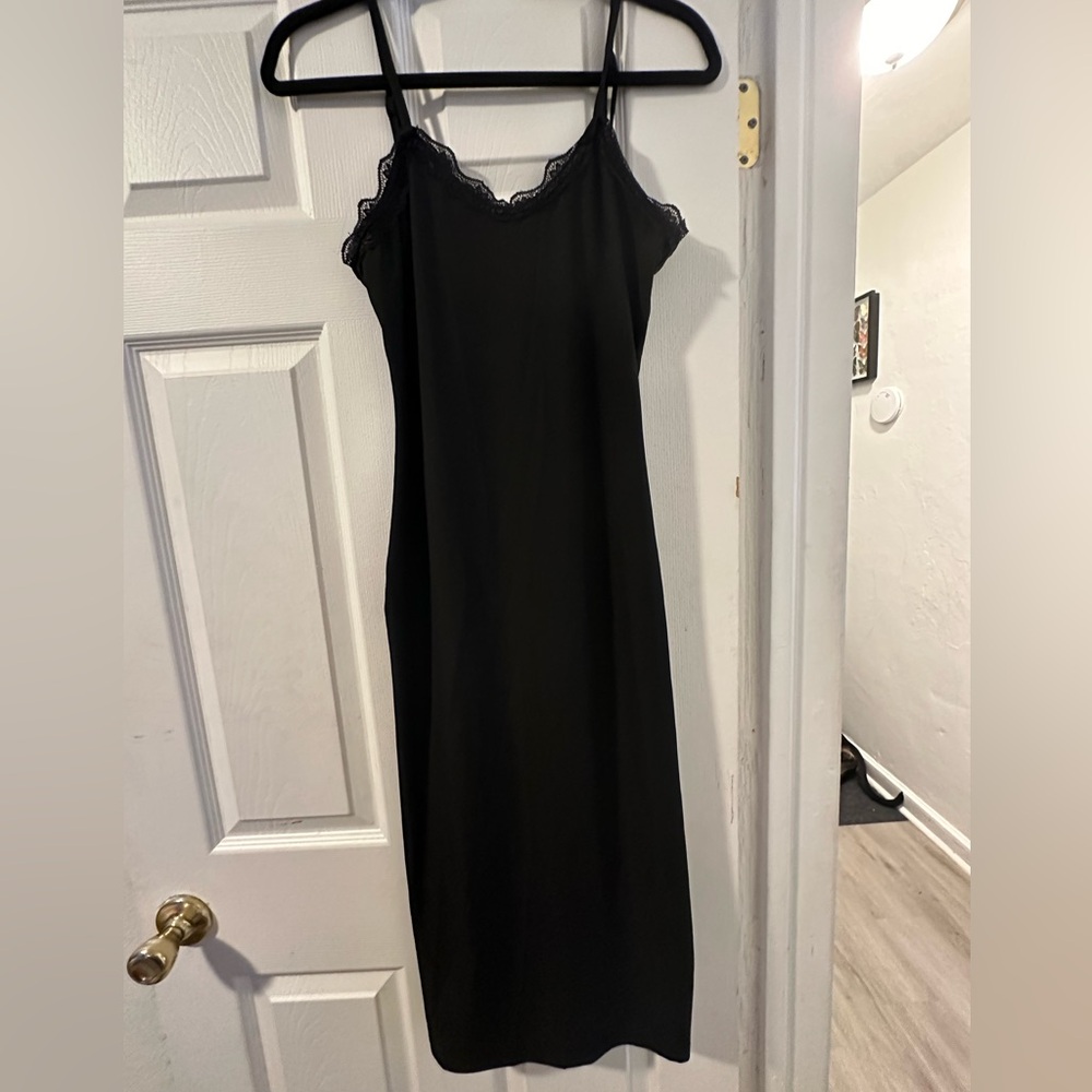 Cute black maxi dress with lace trim!